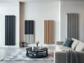 Quattro termosifoni moderni in diverse colorazioni e finiture, ideali per un salotto di design. Scopri i prezzi per rinnovare il tuo ambiente.