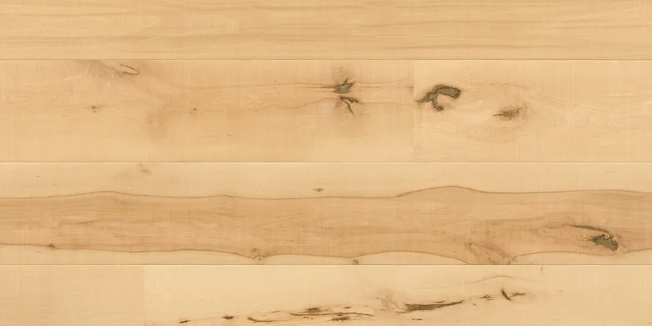 Superficie di parquet faggio naturale con venature evidenti e nodi che raccontano la storia del legno.