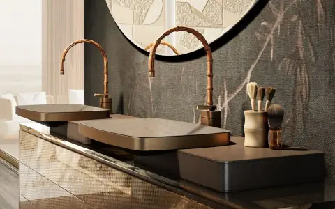 Rubinetti italiani marche di lusso, con design a bambù, su un mobile bagno moderno con lavabi rettangolari.