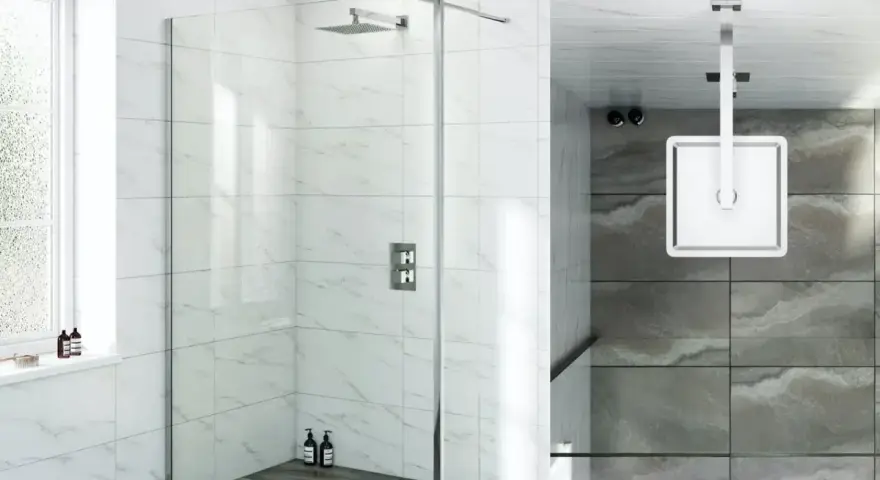Installazione moderna di una colonna doccia con soffione a pioggia e pannelli in vetro.