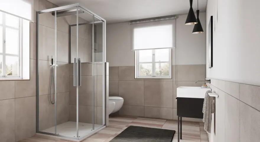 Box doccia angolare moderno con ante scorrevoli in vetro trasparente, che mostra le sue dimensioni ideali per un bagno spazioso.