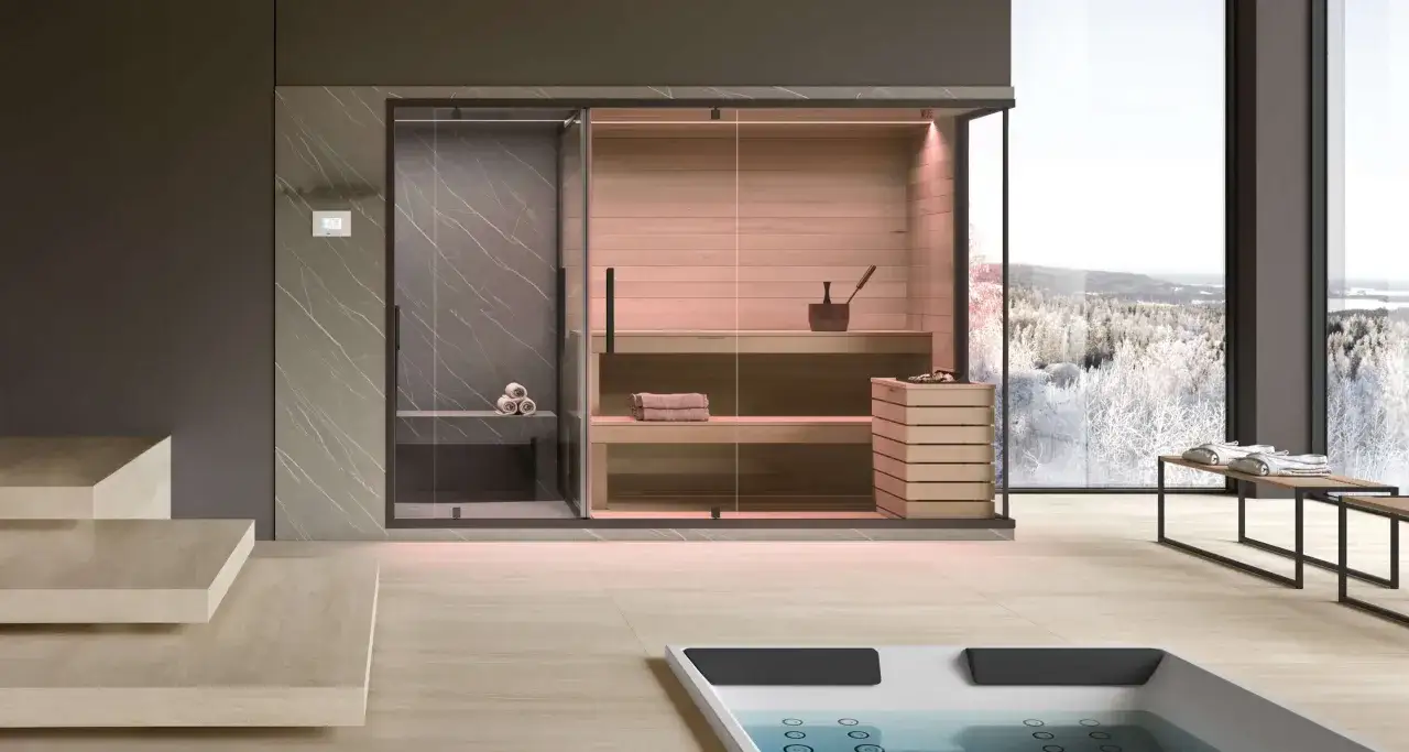 Una moderna spa con sauna e doccia, ideale per il benessere quotidiano. Vista su un paesaggio innevato.