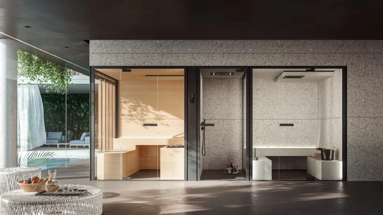 Sauna in legno e bagno turco con doccia, per un relax totale. Scopri la differenza tra sauna e bagno turco in questo spazio moderno.