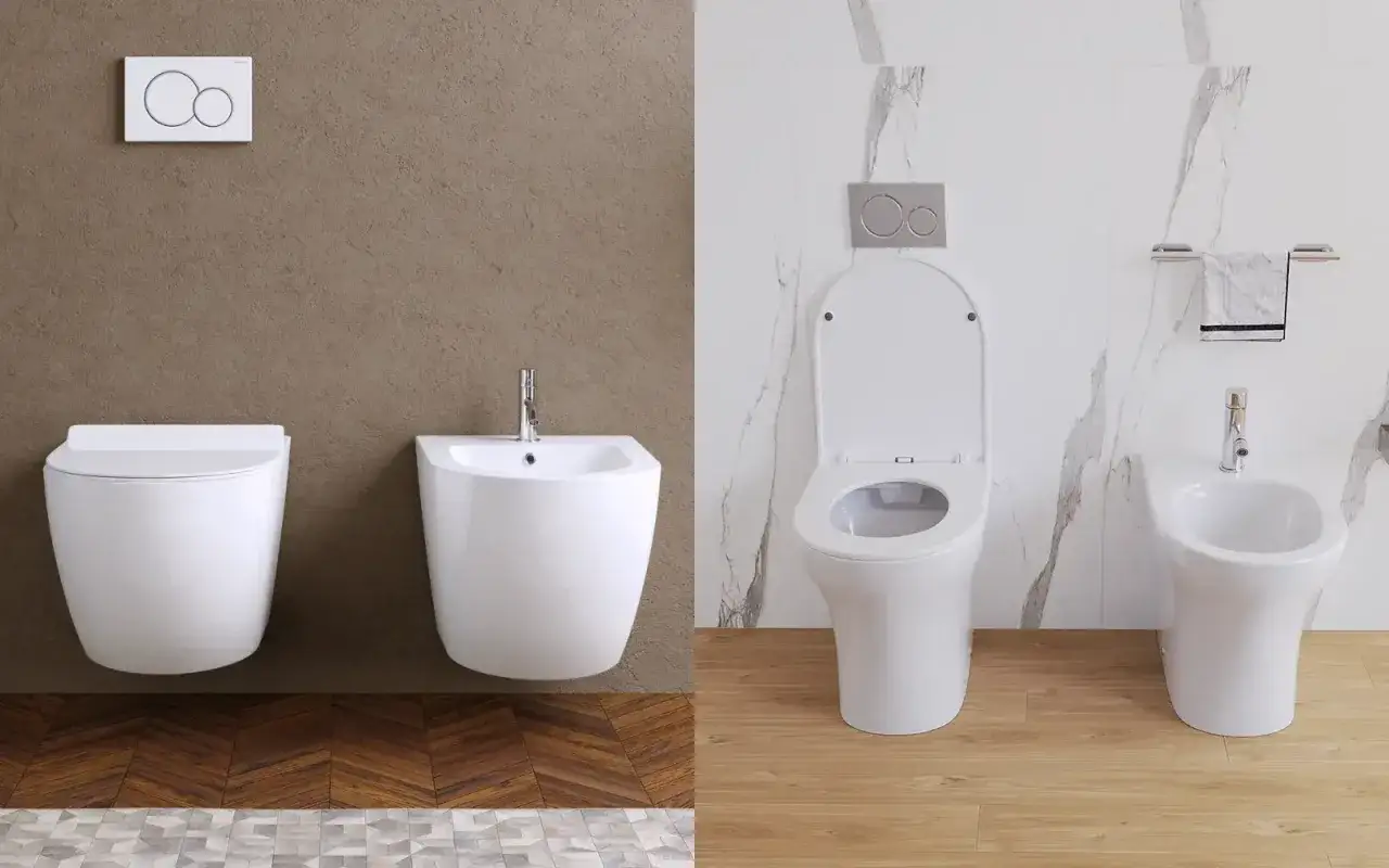 Due bagni moderni, uno con wc e bidet sospesi su muro effetto cemento, l'altro con wc e bidet su muro effetto marmo.